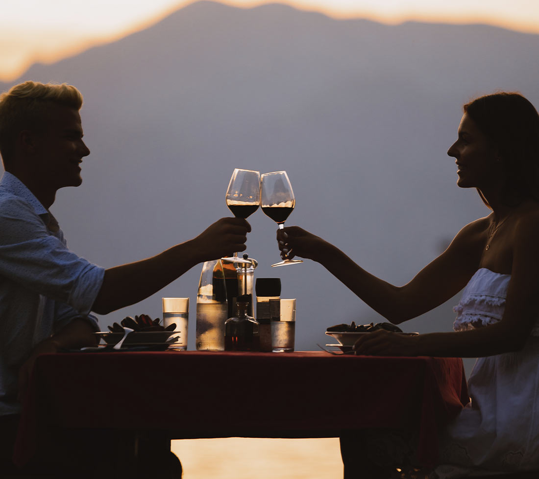 Couple Enjoying Wine While Travelling